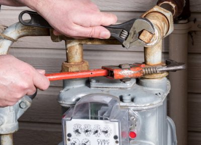 Working on a home gas meeter with tools